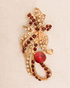 alt message - Manyavar Men Ruby Red Stone Embedded Floral Brooch image number 1