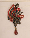 alt message - Manyavar Men Ruby Red Stone Embedded Petal Shaped Brooch image number 1