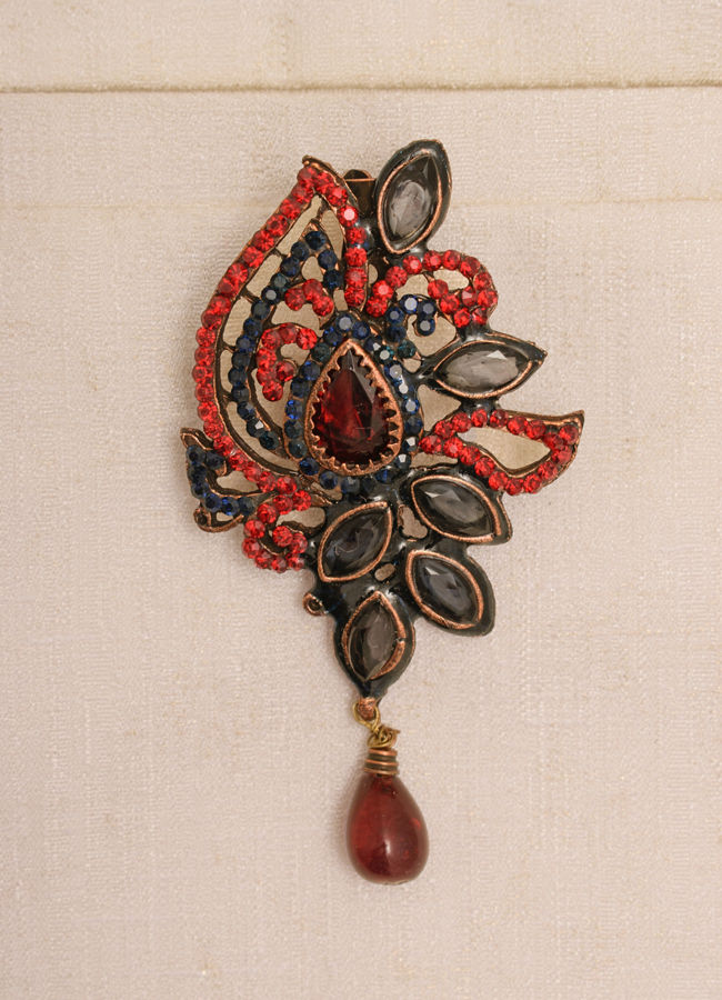 alt message - Manyavar Men Ruby Red Stone Embedded Petal Shaped Brooch image number 1