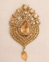 alt message - Manyavar Men Amber Yellow Stone Embedded Drop Shaped Brooch image number 1