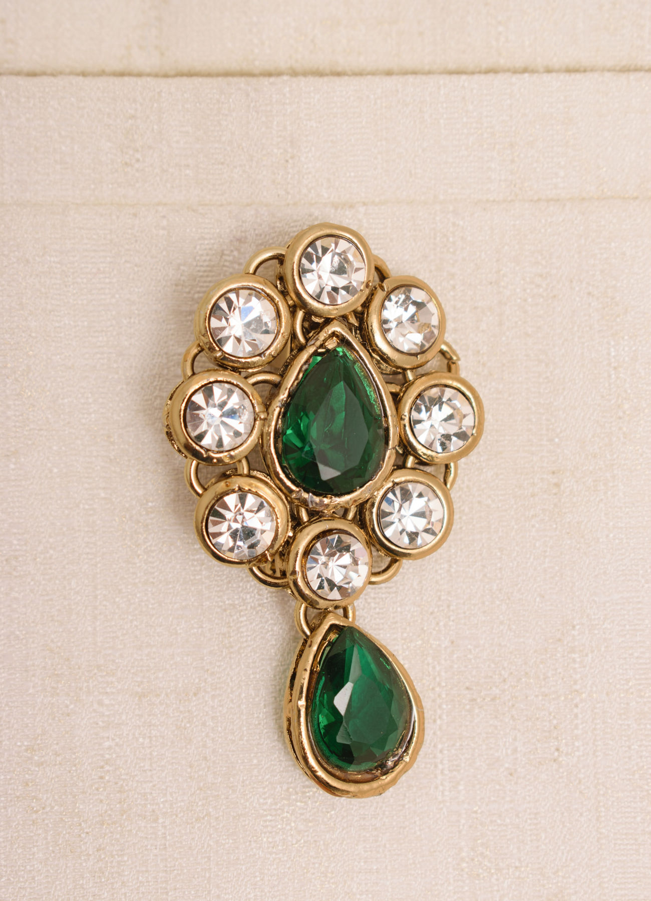Manyavar Men Emerald Green Stone Embedded Drop Shaped Brooch