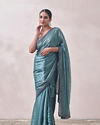 alt message - Mohey Women Teal Blue Stone Embellished Saree image number 0