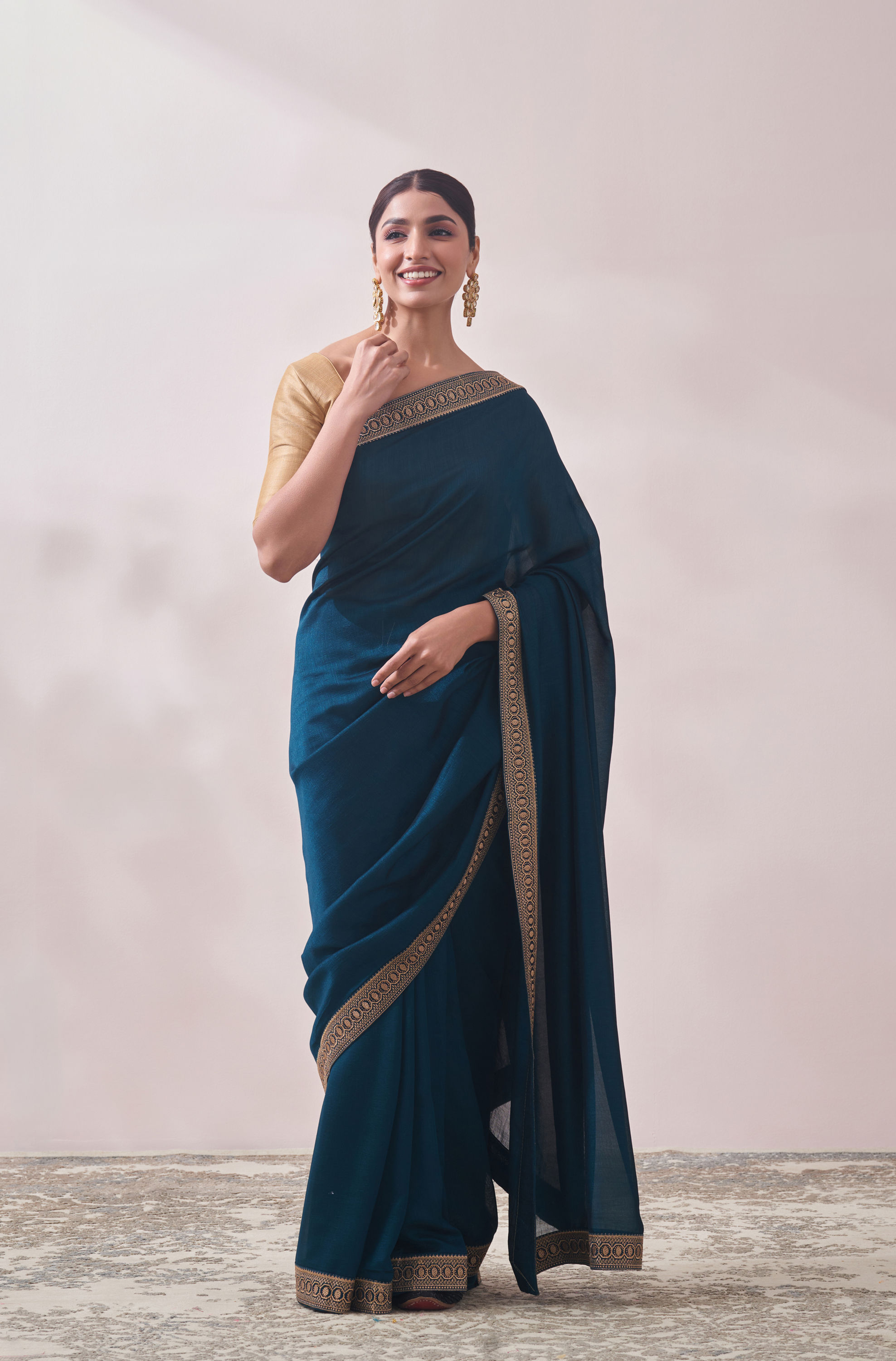 Mohey Women Teal Blue Stone Border Saree