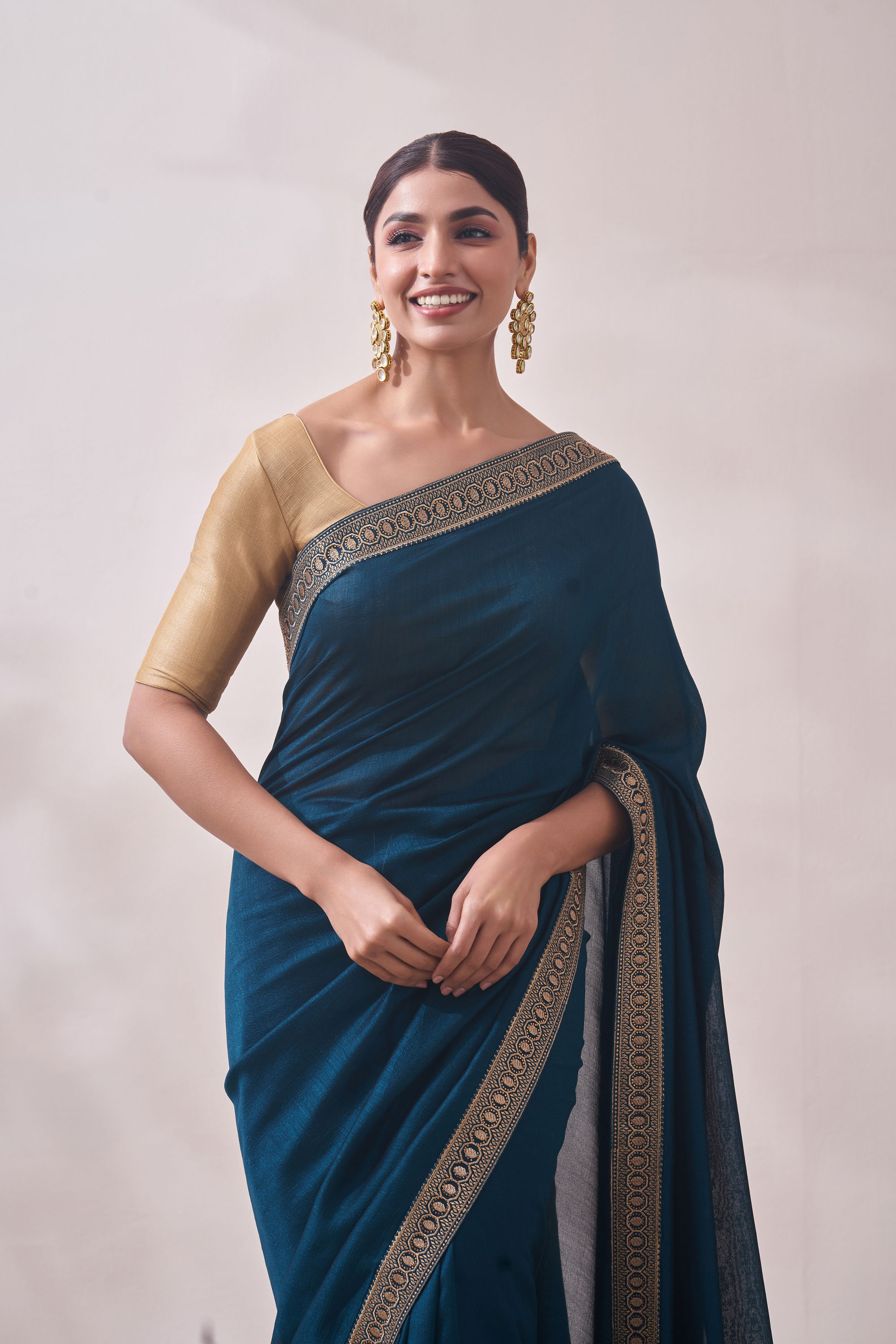 Mohey Women Teal Blue Stone Border Saree