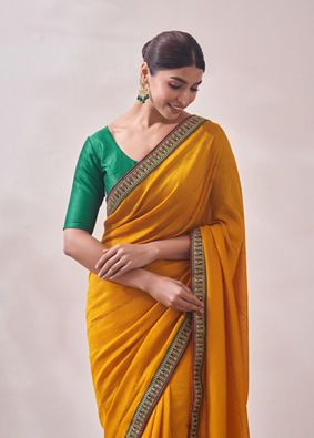 alt message - Mohey Women Mustard Yellow Saree with Contrast Border image number 1