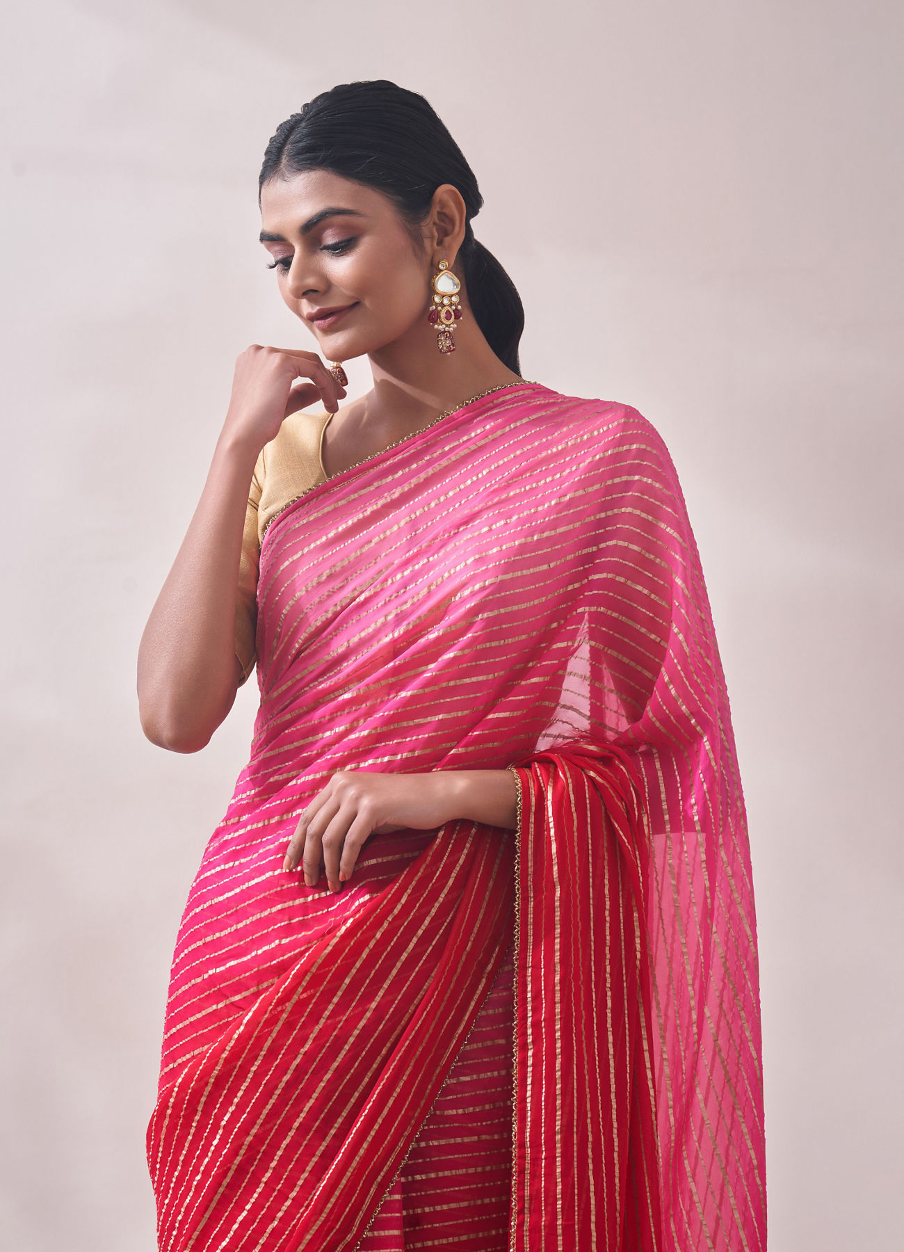 Mohey Women Pink Golden Striped Saree