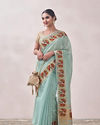 alt message - Mohey Women Light Blue Self Design Saree image number 0