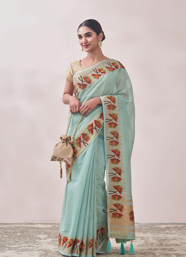 alt message - Mohey Women Light Blue Self Design Saree image number 0