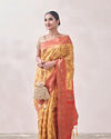 alt message - Mohey Women Sunset Yellow Zari Weaved Saree image number 0