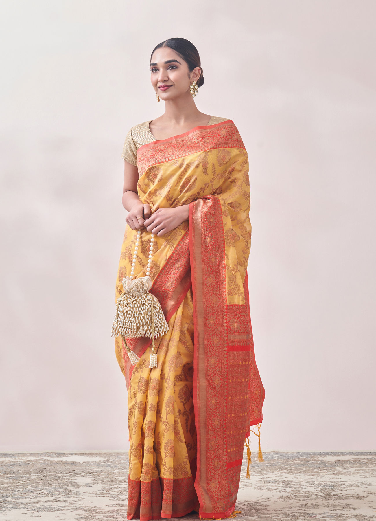 Mohey Women Sunset Yellow Zari Weaved Saree