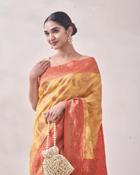 Mohey Women Sunset Yellow Zari Weaved Saree