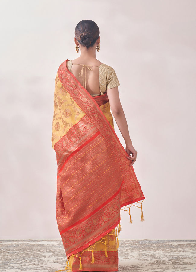Mohey Women Sunset Yellow Zari Weaved Saree
