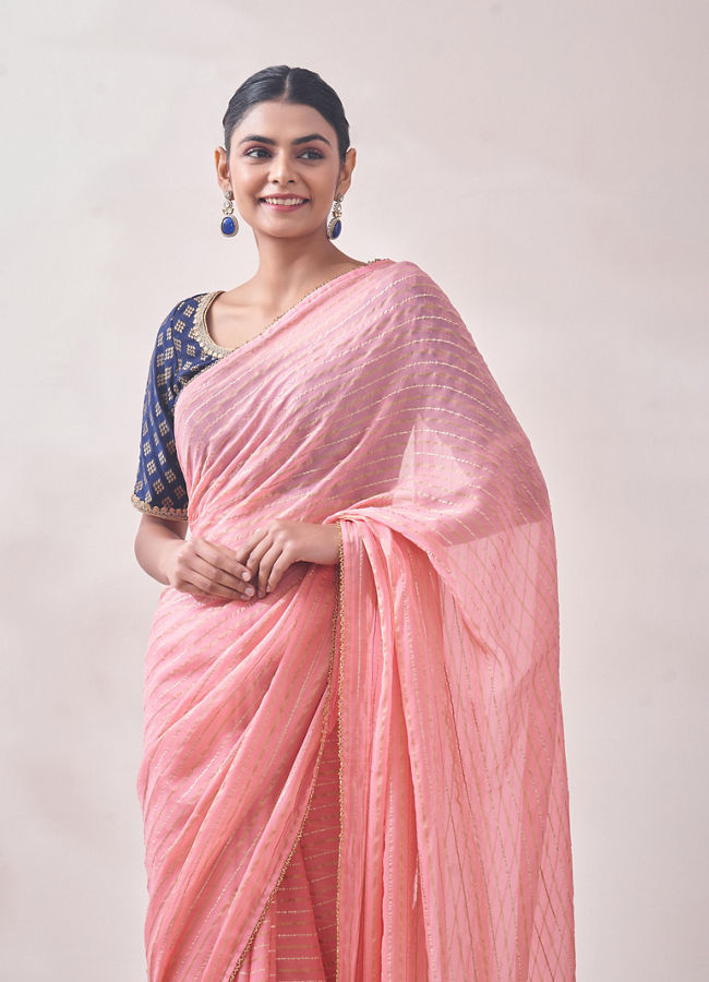 alt message - Mohey Women Pink with Golden Motif Patterned Saree image number 1