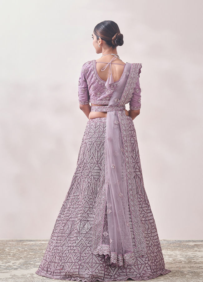 alt message - Mohey Women Mauve Shadow Purple Geometric Patterned Bridal Lehenga image number 3