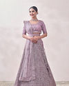 alt message - Mohey Women Mauve Shadow Purple Geometric Patterned Bridal Lehenga image number 0