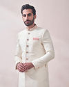 alt message - Manyavar Men Plush Off White Sherwani image number 0