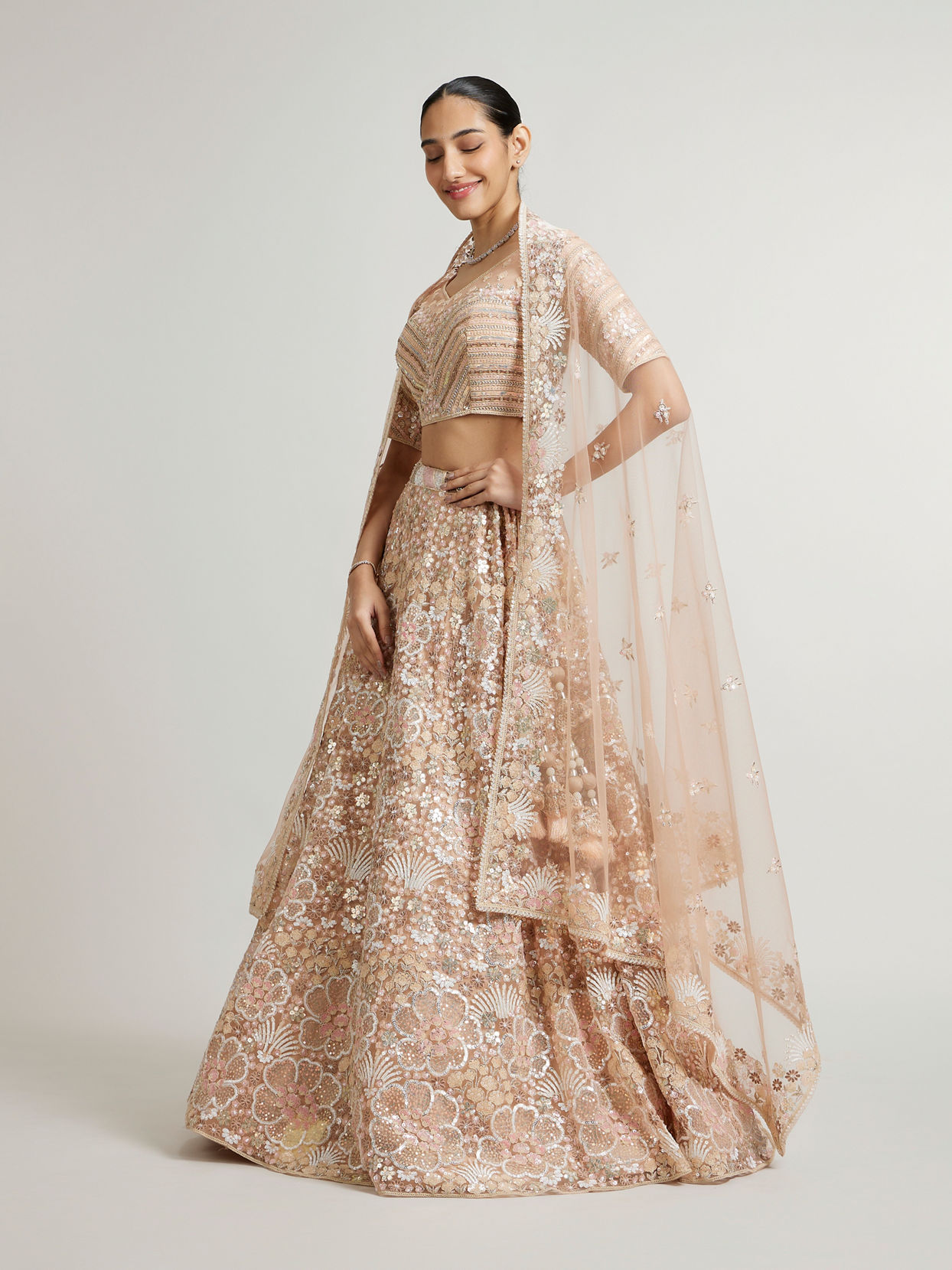 Mohey Women Coral Peach Floral Embriodered Lehenga with Sequin Embellishments