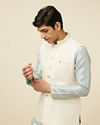 alt message - Manyavar Men Blissful Cream Shade Jacket image number 0