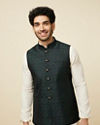 alt message - Manyavar Men Bottle Green Self Print Jacket image number 0