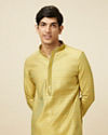 alt message - Manyavar Men Light Yellow Self Design Kurta Set image number 0