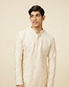 alt message - Manyavar Men Off White Celebration Wear Self Design Kurta Pajama image number 0