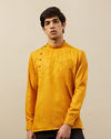 alt message - Manyavar Men Amber Orange Angrakha Style Short Kurta image number 0