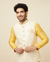 alt message - Manyavar Men Light Cream Booti Print Jacket image number 0