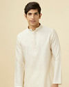 alt message - Manyavar Men Sublime Cream Jacquard Kurta Set image number 0