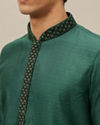 alt message - Manyavar Men Hunter Green Bel Buti Patterned Kurta Set image number 1