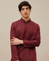 alt message - Manyavar Men Chilli Pepper Red Self Patterned Kurta Set image number 0