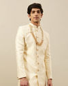 alt message - Manyavar Men Buttercream Ogee Patterned Achkan Style Sherwani image number 0