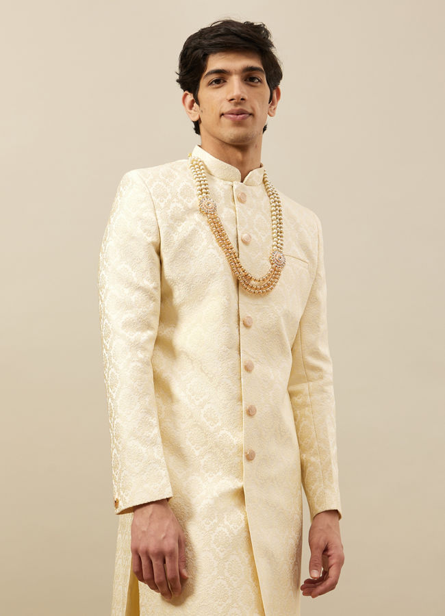 alt message - Manyavar Men Buttercream Ogee Patterned Achkan Style Sherwani image number 0