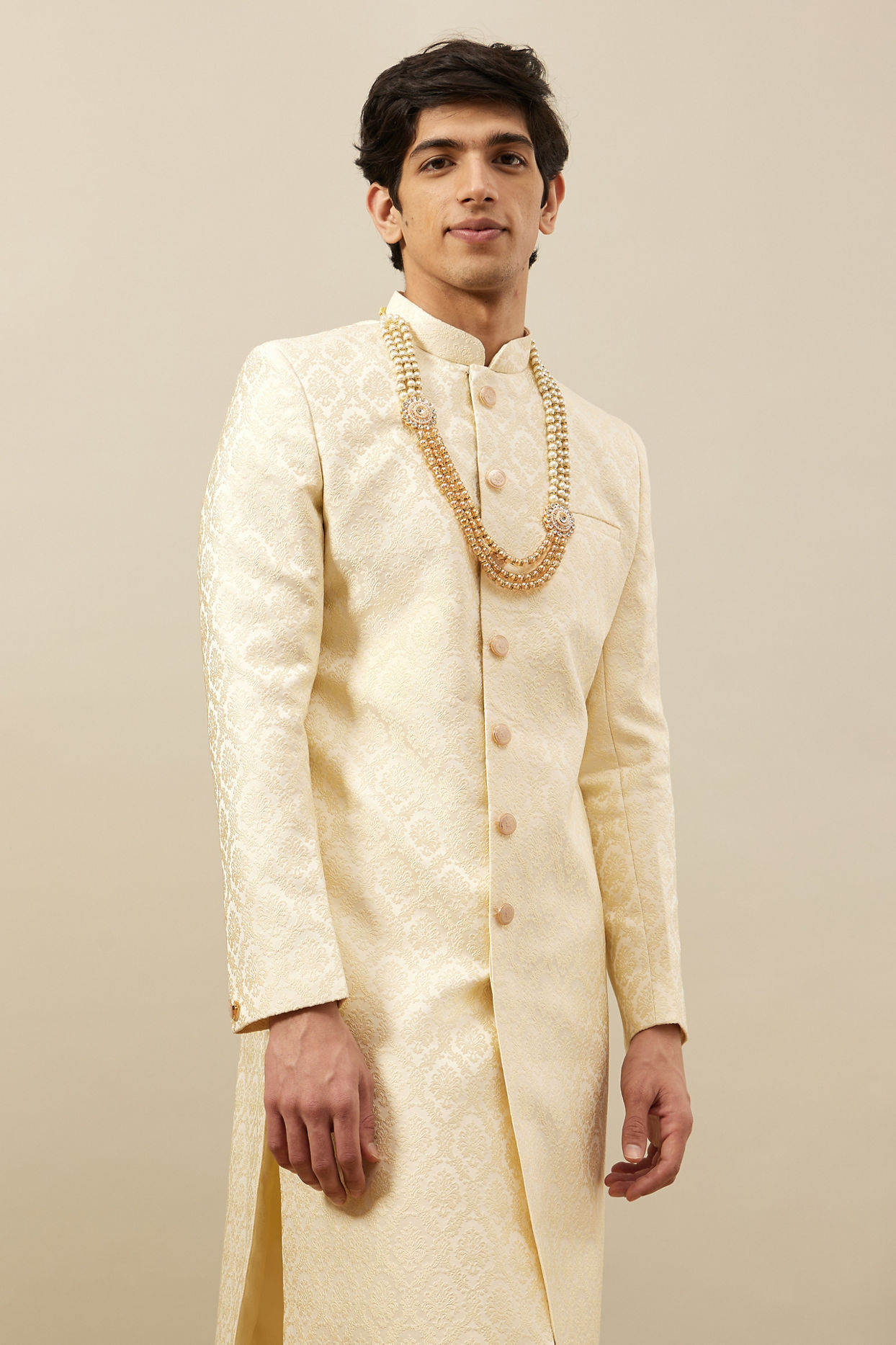 alt message - Manyavar Men Buttercream Ogee Patterned Achkan Style Sherwani image number 0