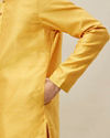 alt message - Manyavar Men Illuminating Yellow Floral Patterned Kurta Set image number 3