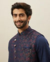 alt message - Manyavar Men Twilight Blue Floral Angrakha Style Kurta Jacket Set image number 0