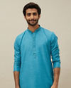 alt message - Manyavar Men Ferozi Blue Embroidered Placket Kurta Set image number 0