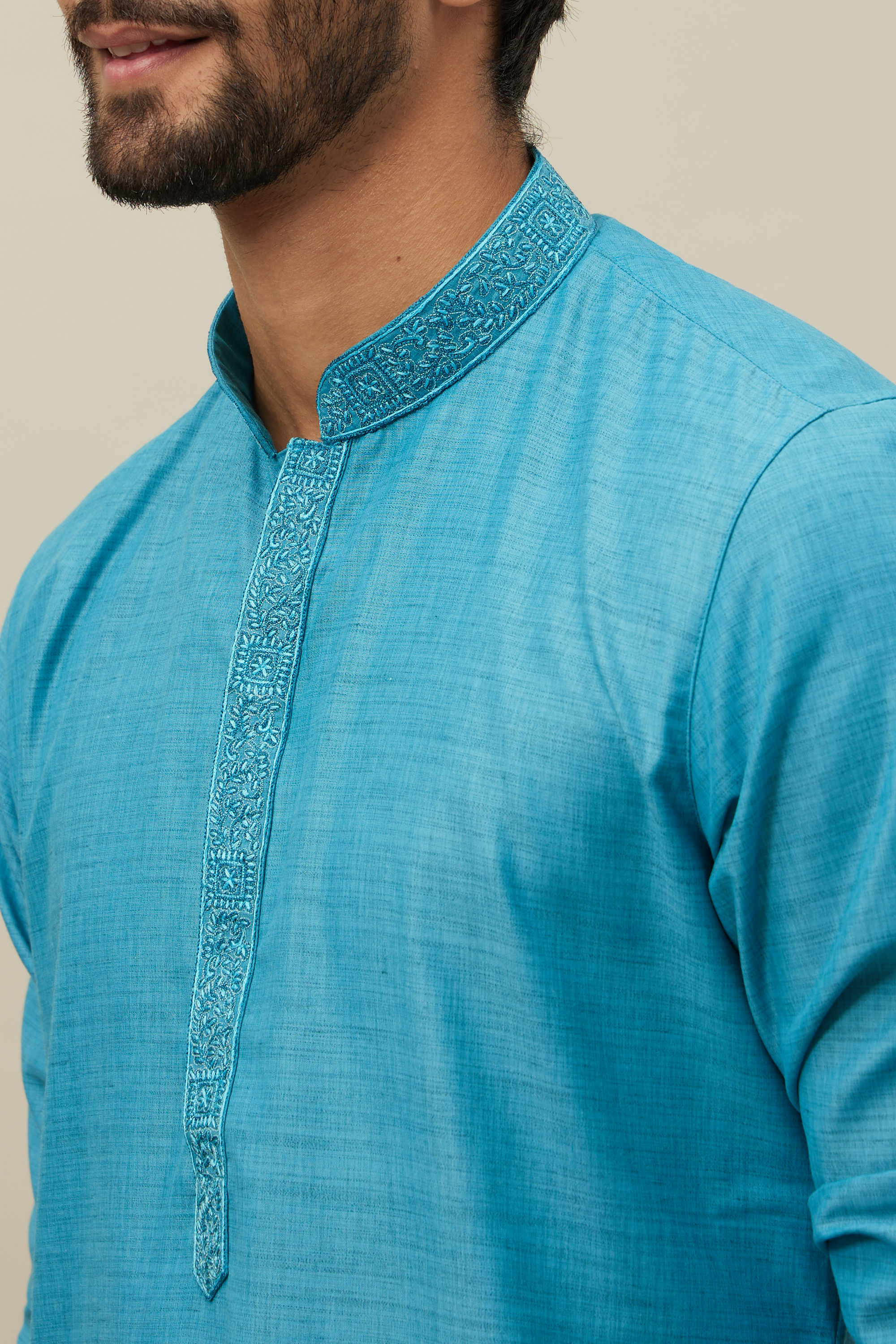 Manyavar Men Ferozi Blue Embroidered Placket Kurta Set