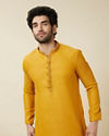 alt message - Manyavar Men Amber Orange Embroidered Bandhgala Kurta Set image number 0