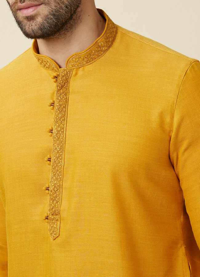 alt message - Manyavar Men Amber Orange Embroidered Bandhgala Kurta Set image number 1