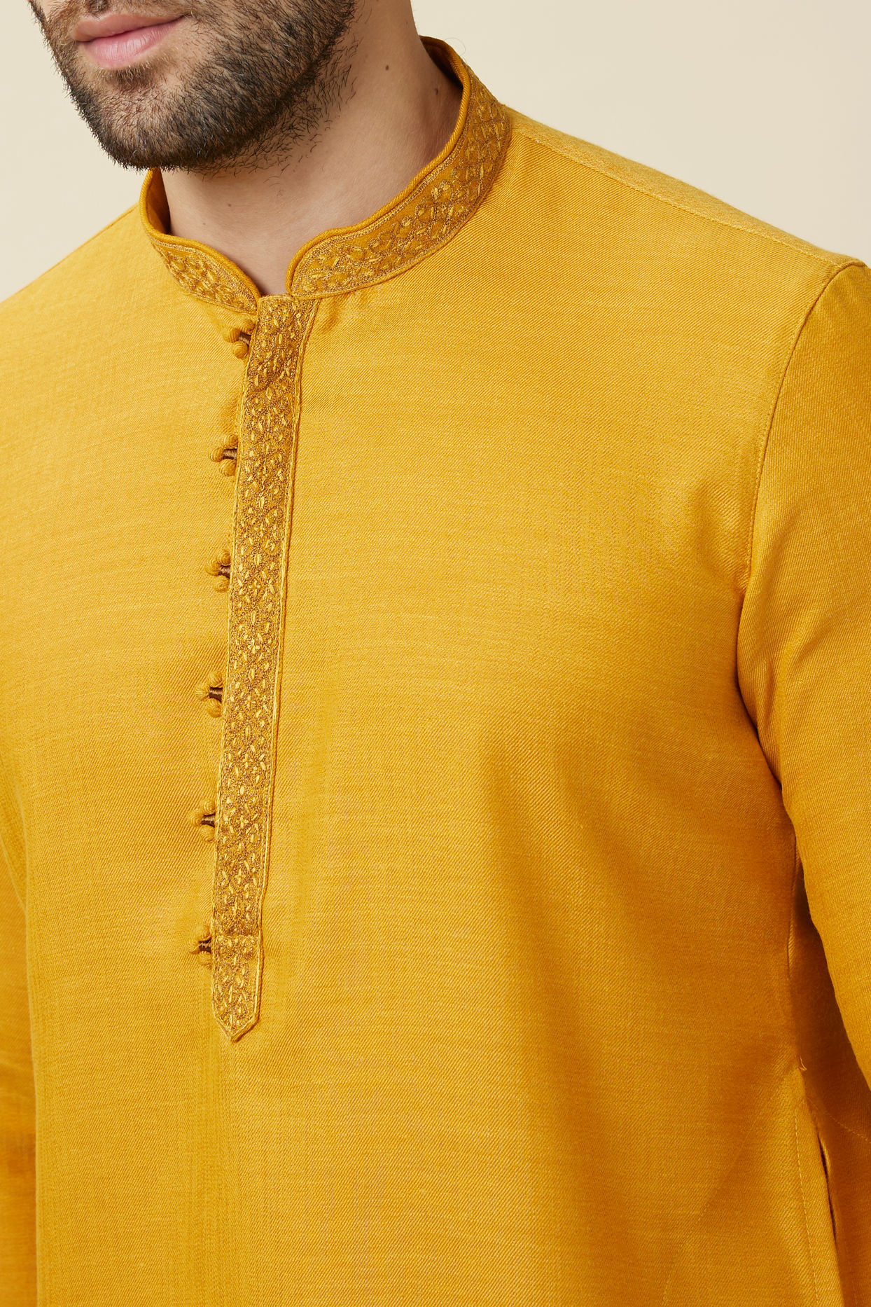 alt message - Manyavar Men Amber Orange Embroidered Bandhgala Kurta Set image number 1