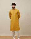 Manyavar Men Candlelight Orange Bel Buti Patterned Placket Kurta Set