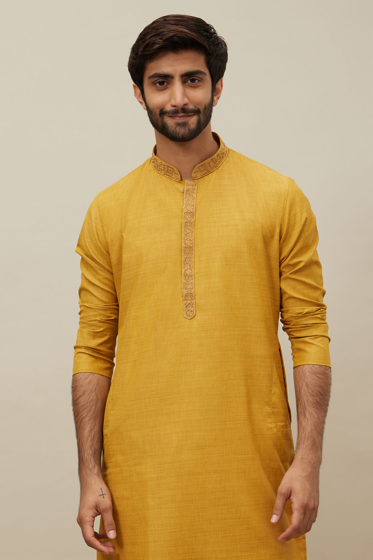 alt message - Manyavar Men Candlelight Orange Bel Buti Patterned Placket Kurta Set image number 0