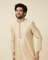 alt message - Manyavar Men Sand Beige Leaf Patterned Kurta Set image number 0