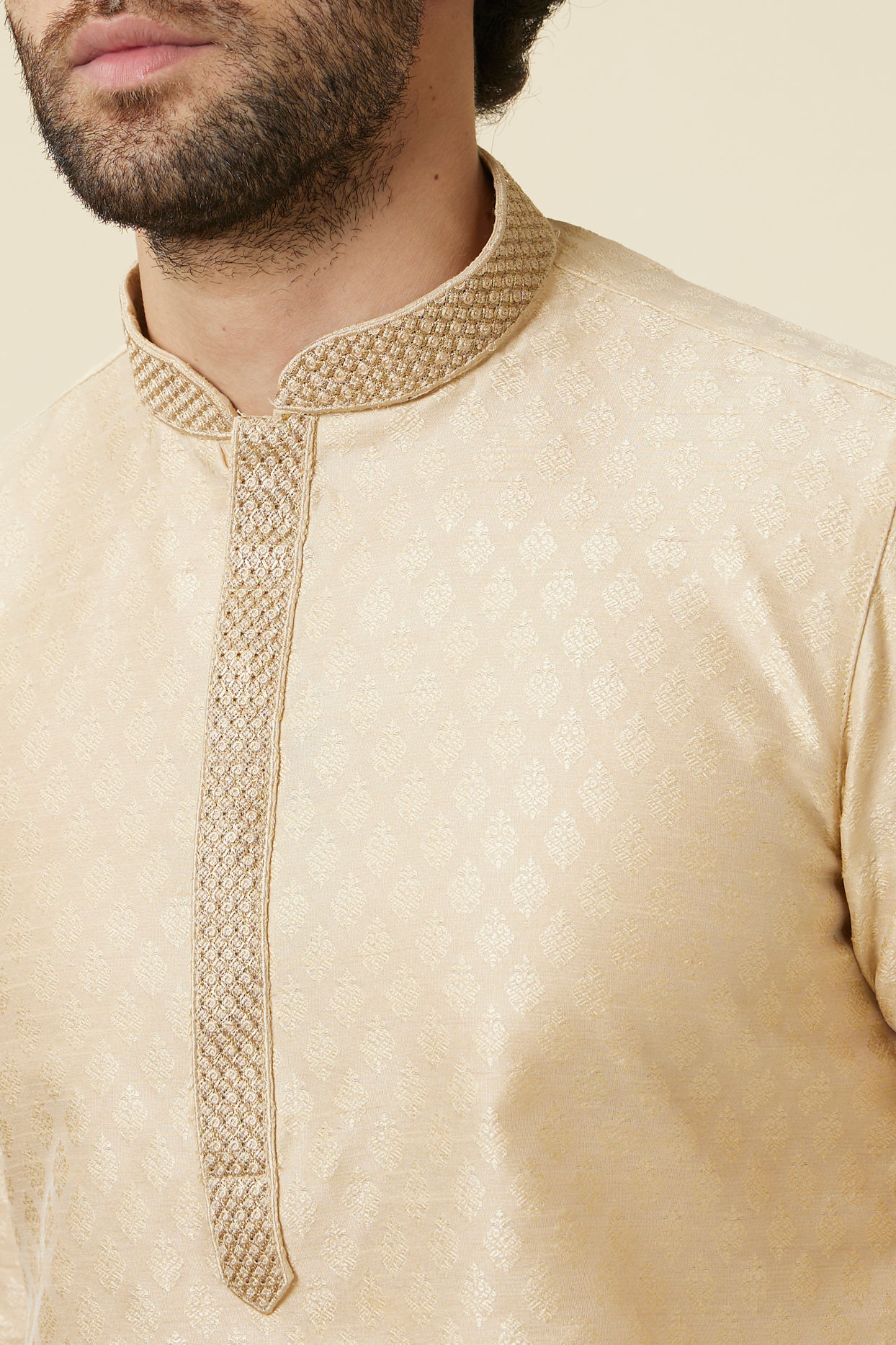 alt message - Manyavar Men Sand Beige Leaf Patterned Kurta Set image number 1