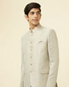 alt message - Manyavar Men Pistachio Green Ogee Patterned Suit image number 0