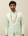 alt message - Manyavar Men Mint Julep Green Floral Patterned Indo Western Set image number 0