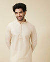 alt message - Manyavar Men Antique White Leaf Patterned Kurta Set image number 0