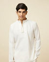 alt message - Manyavar Men Ivory White Embroidered Neckline Short Kurta image number 0