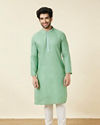 alt message - Manyavar Men Mint Green Embroidered Neckline Kurta Set image number 2