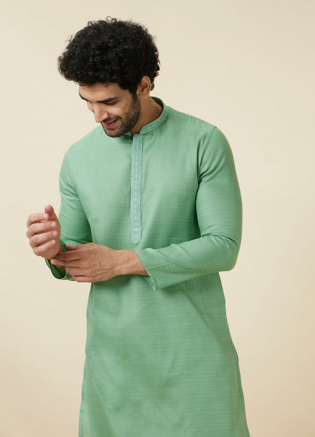 alt message - Manyavar Men Mint Green Embroidered Neckline Kurta Set image number 0